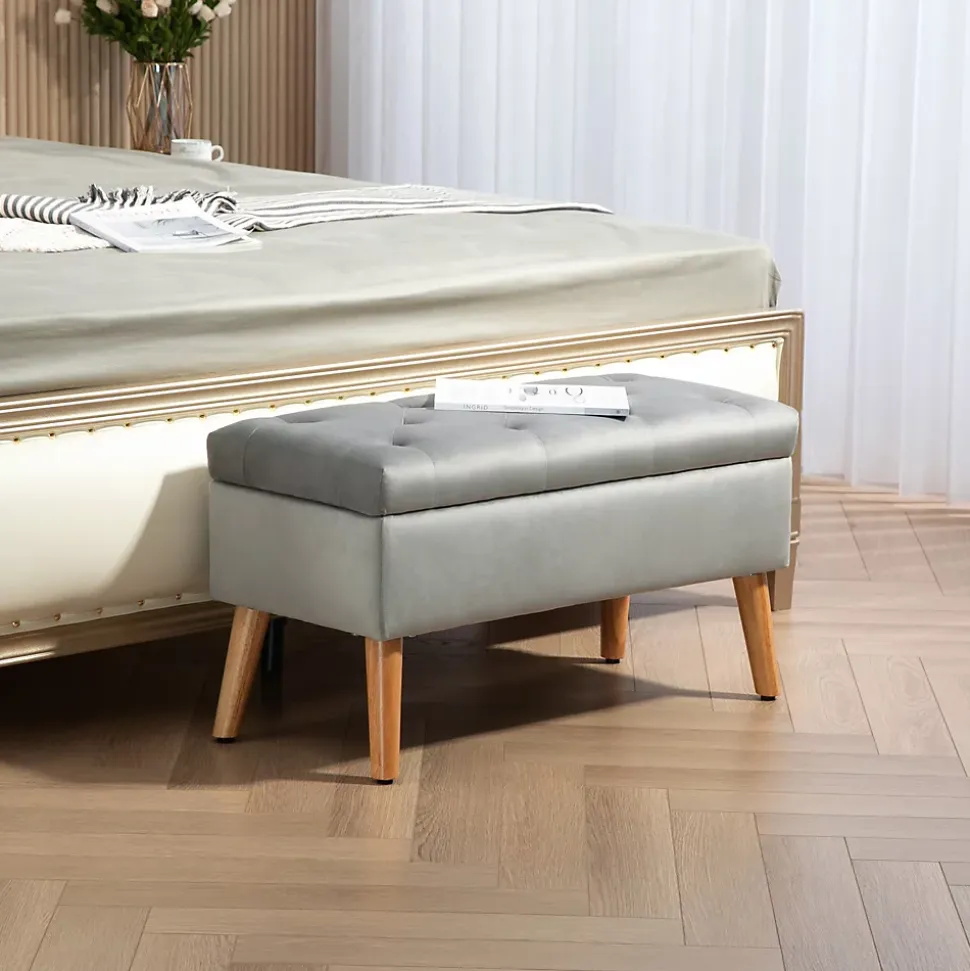 Banquette coffre design scandinave piètement effilé bois assise effet capitonné velours gris