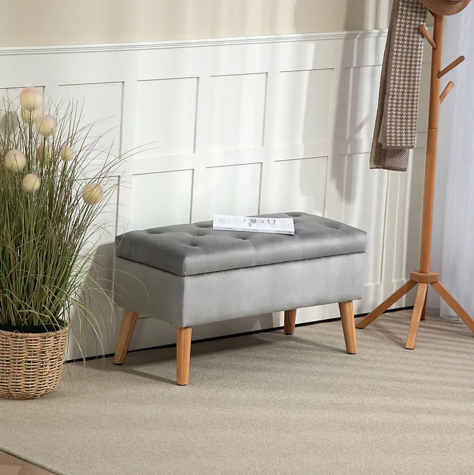 Banquette coffre design scandinave piètement effilé bois assise effet capitonné velours gris