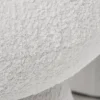 Banquette tapissée avec structure et pieds en boucle blanche