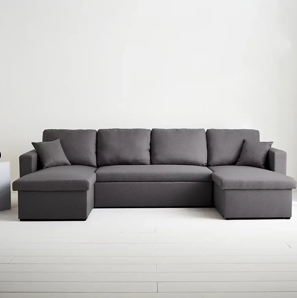 Canapé panoramique convertible en tissu gris foncé. 4 places. coffre rangement. lit modulable