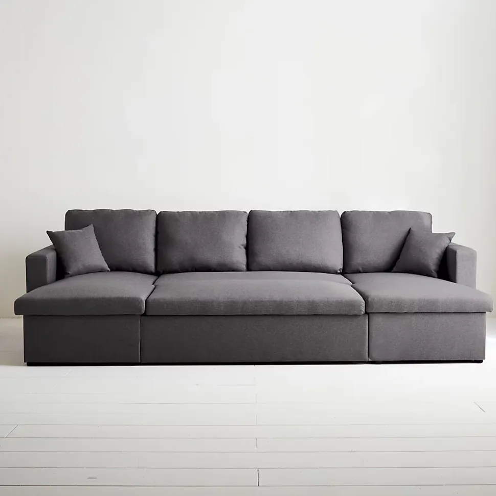 Canapé panoramique convertible en tissu gris foncé. 4 places. coffre rangement. lit modulable