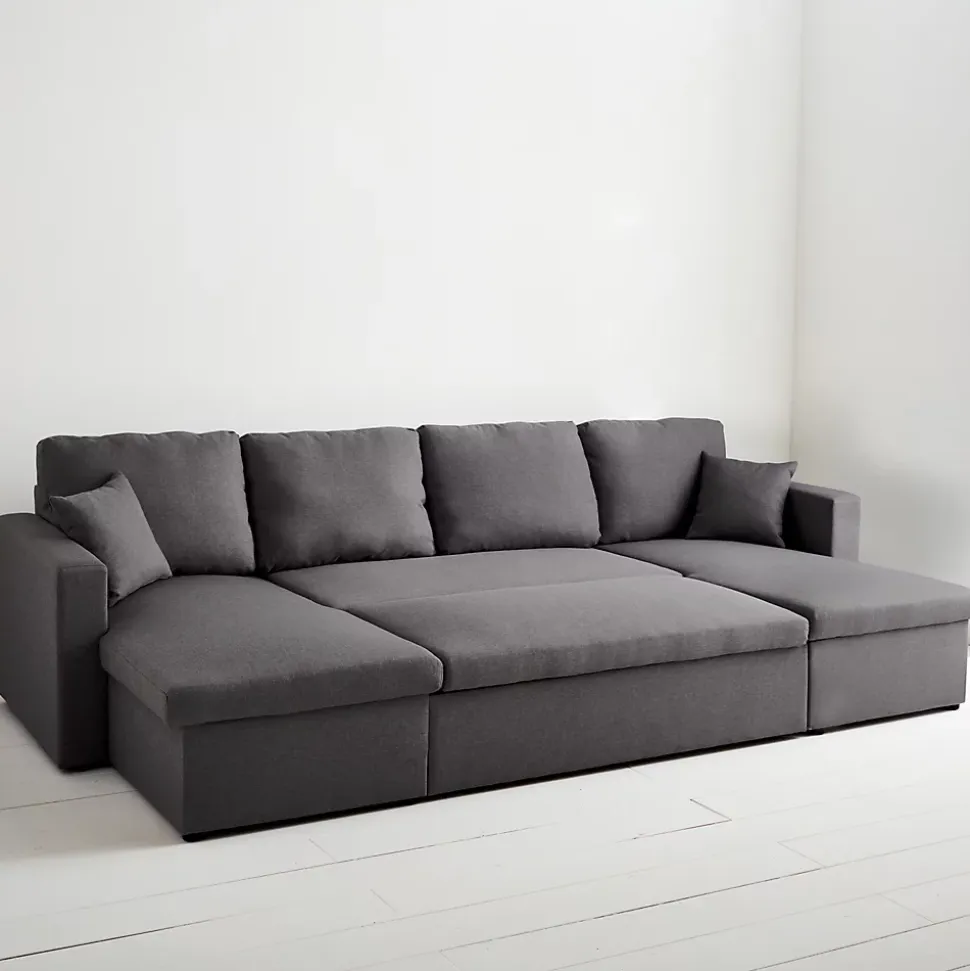 Canapé panoramique convertible en tissu gris foncé. 4 places. coffre rangement. lit modulable