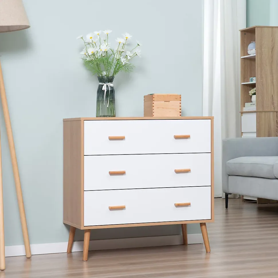 Commode design scandinave sur pieds 3 tiroirs coulissants pieds effilés inclinés panneaux particules blanc aspect bois clair