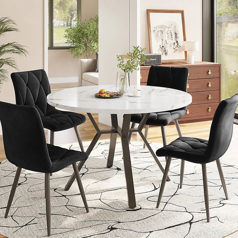 Ensemble table ronde 100x75 cm avec 4 chaises velours, plateau MDF effet marbre et structure métal noir