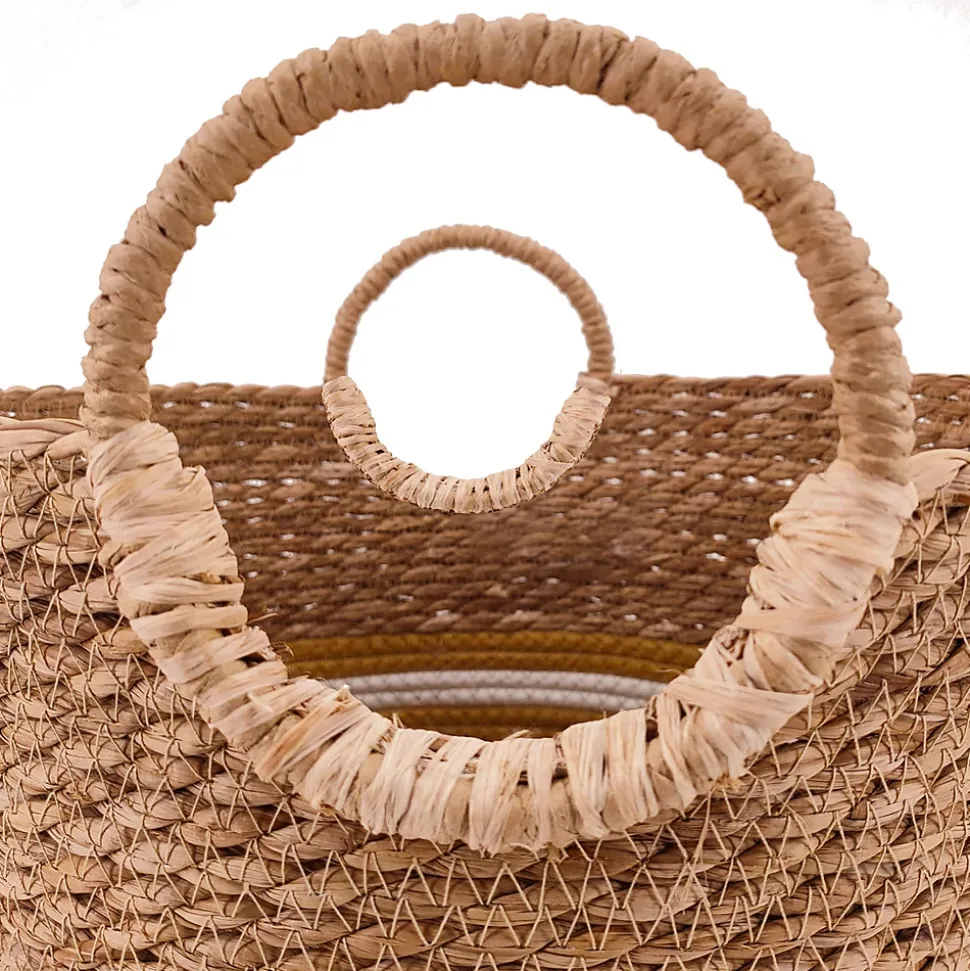 Panier rond en fibres naturelles Ornami vert et blanc avec poignées rondes