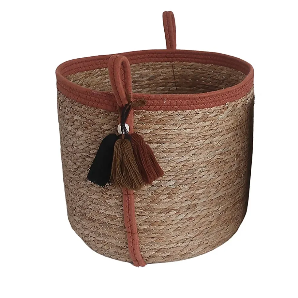 Panier rond en jonc de mer Norasia terracotta et couleur naturelle avec pompons taille L