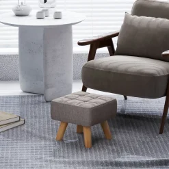 Pouf repose-pieds style nordique piètement bois incliné tissu assise effet capitonné gris